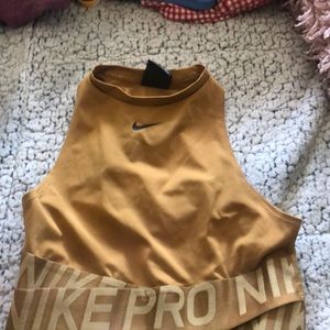 Mustard yellow Nike athletic bra